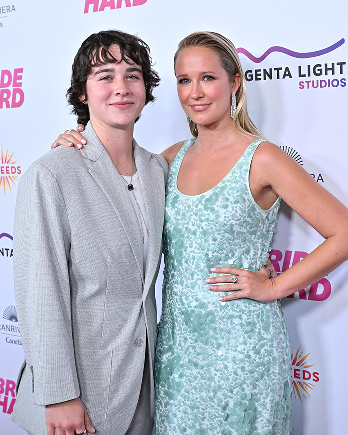 Pitch Perfect star poses with girlfriend defending 18-year age gap in statement amid backlash at event.