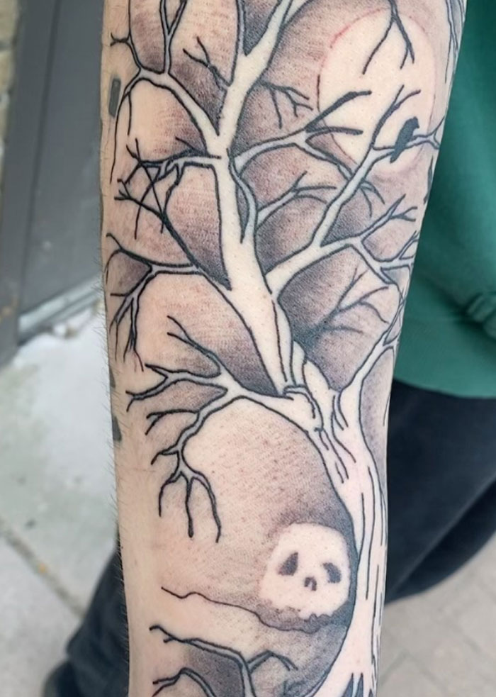 Poison tree tattoo on forearm with detailed branches and a skull, showcasing symbolism and unique tattoo styles. Poison tree tattoo on forearm with detailed branches and a skull, showcasing symbolism and unique tattoo styles.