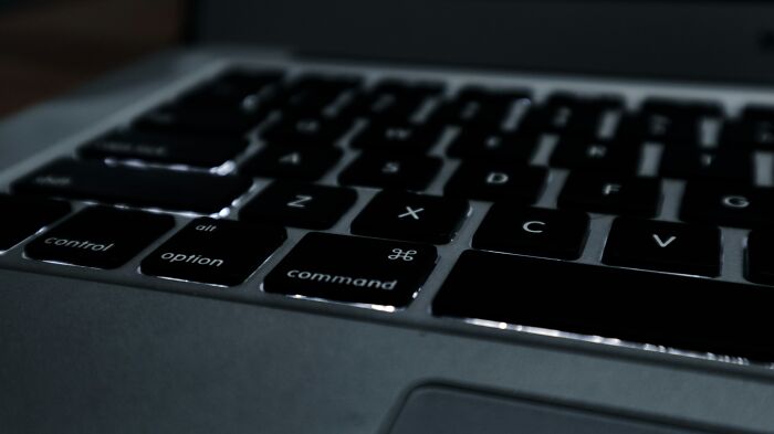 Close-up of a dark computer keyboard with focus on control, option, and command keys illustrating scary online moments.
