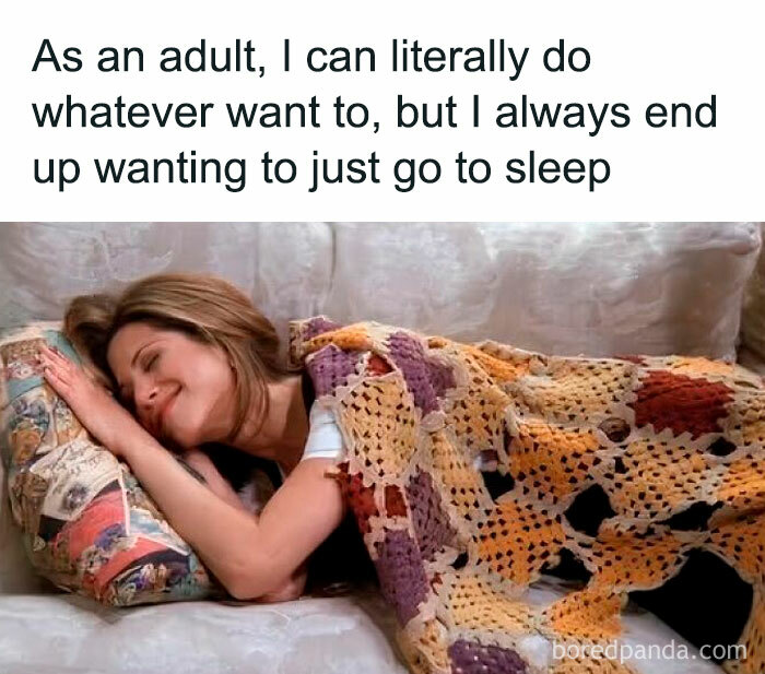 Woman lying on a couch wrapped in a blanket with a meme about adults wanting to decompress by sleeping.