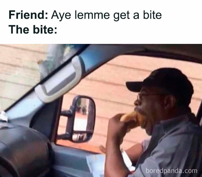 Man in a car taking a huge bite of a sandwich, capturing relatable energy meme humor about food sharing.