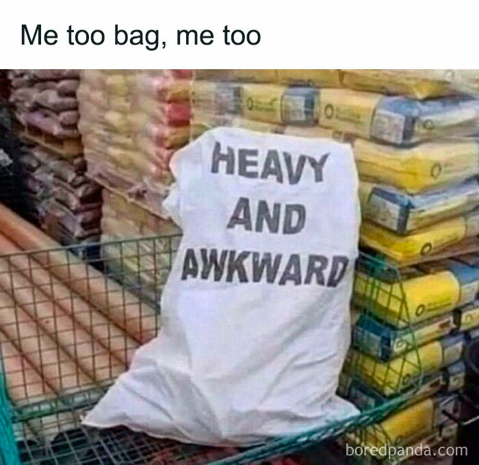 Bag labeled heavy and awkward in a store cart with relatable energy meme text about awkwardness and weight