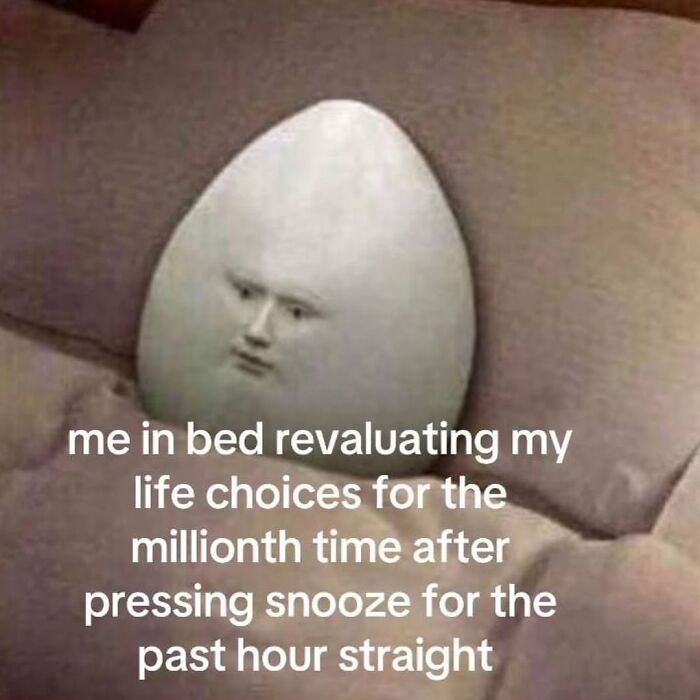 A relatable meme showing an egg-shaped figure in bed, capturing the chaos of navigating life as a woman today.