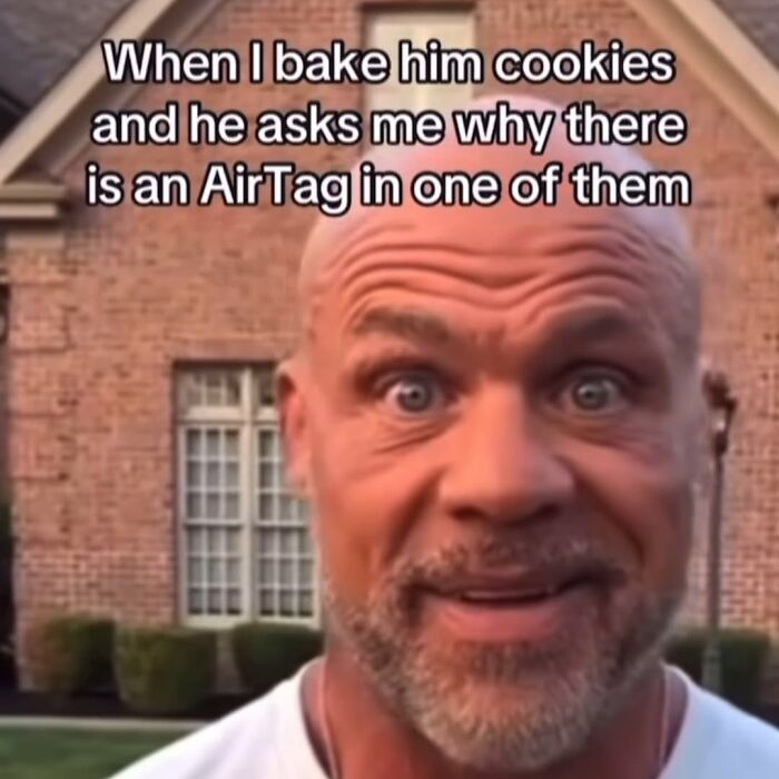 Man with surprised face outside brick house, caption about baking cookies and hiding an AirTag, relatable woman memes theme.
