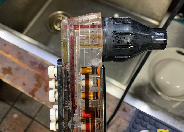 Close-up of a chain restaurant electrical tool highlighting safety concerns chain restaurant employees warn about.