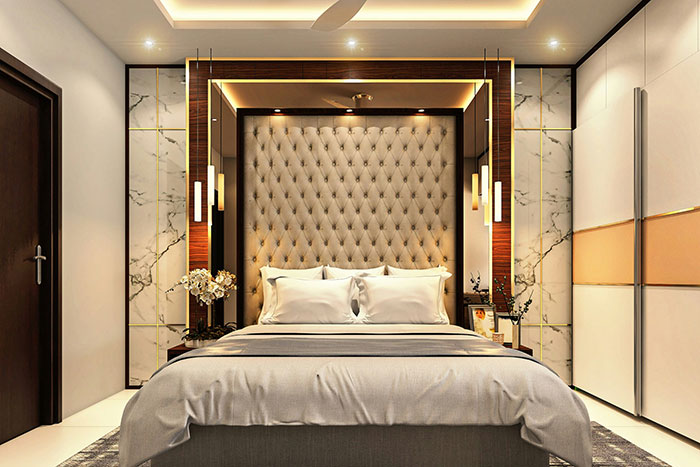 Luxurious modern bedroom showcasing rich people behavior in high-end hotels with elegant lighting and plush furnishings.