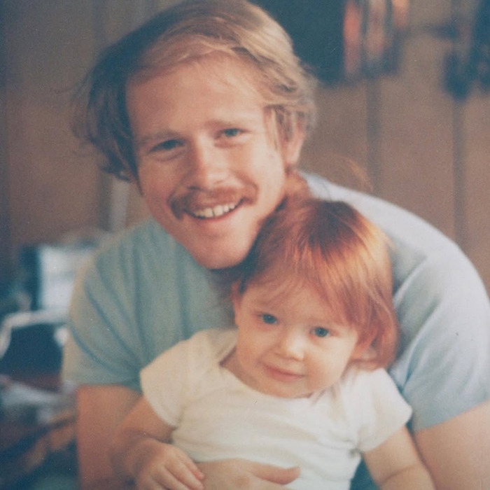 Vintage photo of a man and a child, representing Ron Howard&rsquo;s nepo baby Bryce Dallas Howard's childhood moments.