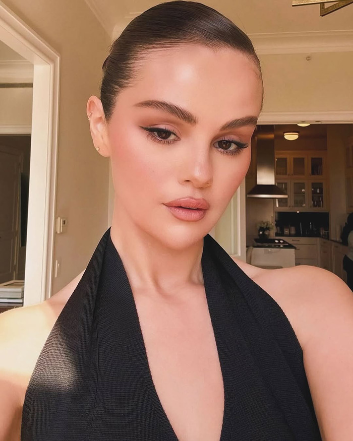 Selena Gomez posing indoors with sleek hairstyle, natural makeup, and a black halter top, relating to Selena Gomez flavored Oreo debate. Selena Gomez posing indoors with sleek hairstyle, natural makeup, and a black halter top, relating to Selena Gomez flavored Oreo debate.