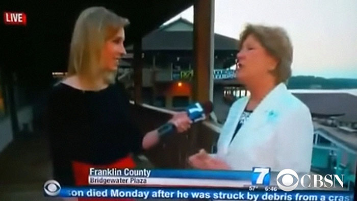 Live television interview at Franklin County Bridgewater Plaza with reporter holding microphone and guest speaking on camera.