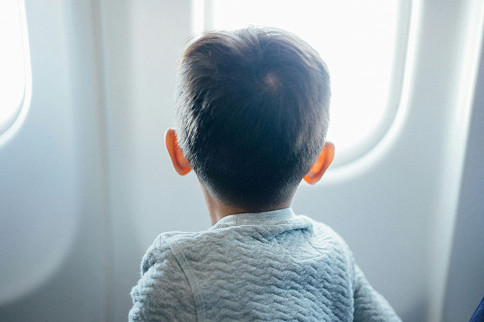 Person Upgrades To Business Class To Escape Mid-Flight Babysitting, Vacation Turns Tense Person Upgrades To Business Class To Escape Mid-Flight Babysitting, Vacation Turns Tense