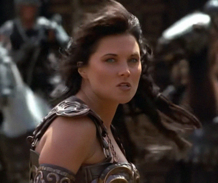 Woman dressed as a warrior in armor with windblown hair, representing kids' lies that started off silly and got real