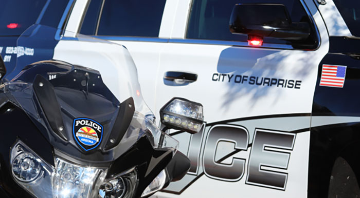 Police car and motorcycle from city of Surprise investigating 5th grade girls' revenge plot to slay boy in school case. Police car and motorcycle from city of Surprise investigating 5th grade girls' revenge plot to slay boy in school case.