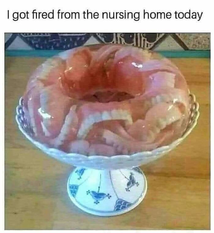 Disgusting food photo showing a gelatin mold filled with dentures, highlighting an unappetizing and unsettling dish.