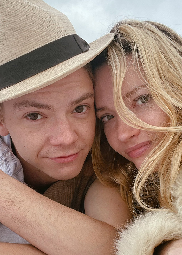 Close-up photo of two people embracing, highlighting viral photos and Sean Connery debate at same age comparison.