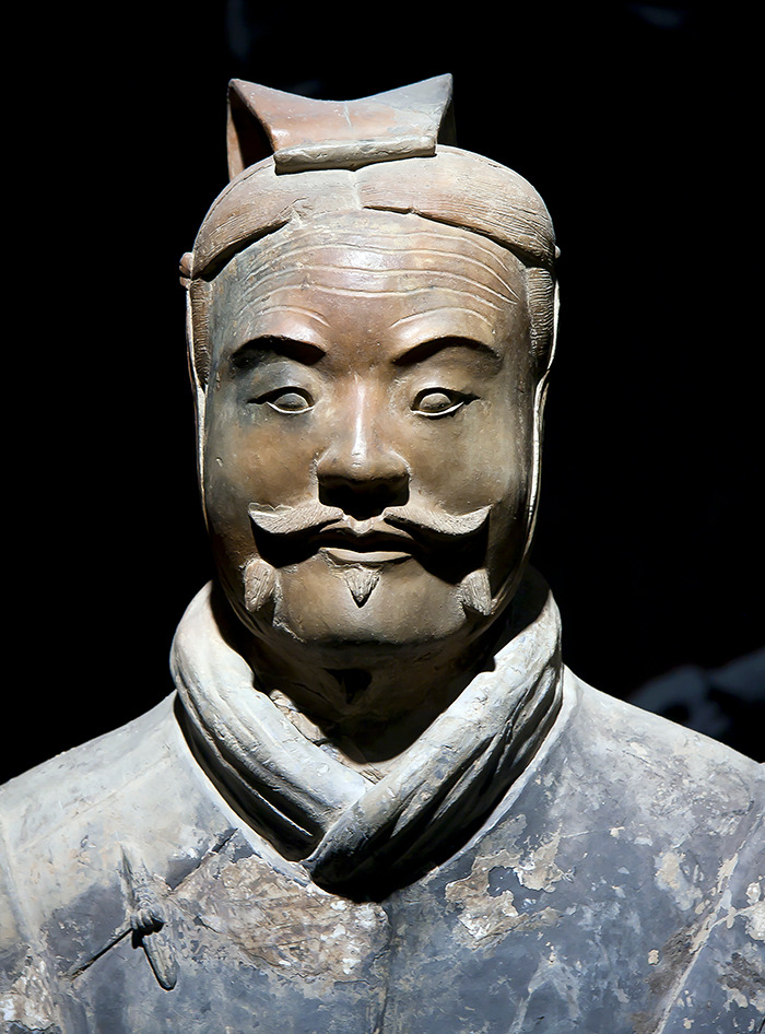 Close-up of a 2000-year-old statue with a mustache, representing ancient historical art damaged by a tourist incident. Close-up of a 2000-year-old statue with a mustache, representing ancient historical art damaged by a tourist incident.