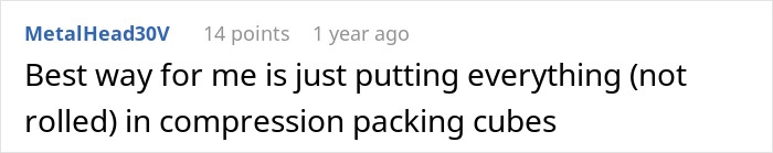 Red TSA security checkpoint with a traveler preparing to go through a screening line at the airport.