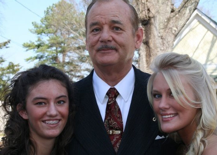 Three people smiling outdoors, sharing their most unbelievable experiences they can prove to skeptics.