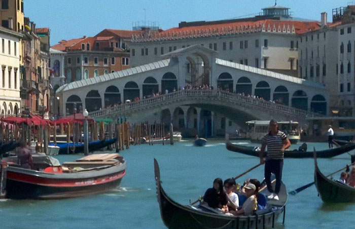 Venice canal with gondolas and the Rialto Bridge in the background, related to Jeff Bezos and Lauren Sánchez wedding rules. Venice canal with gondolas and the Rialto Bridge in the background, related to Jeff Bezos and Lauren Sánchez wedding rules.