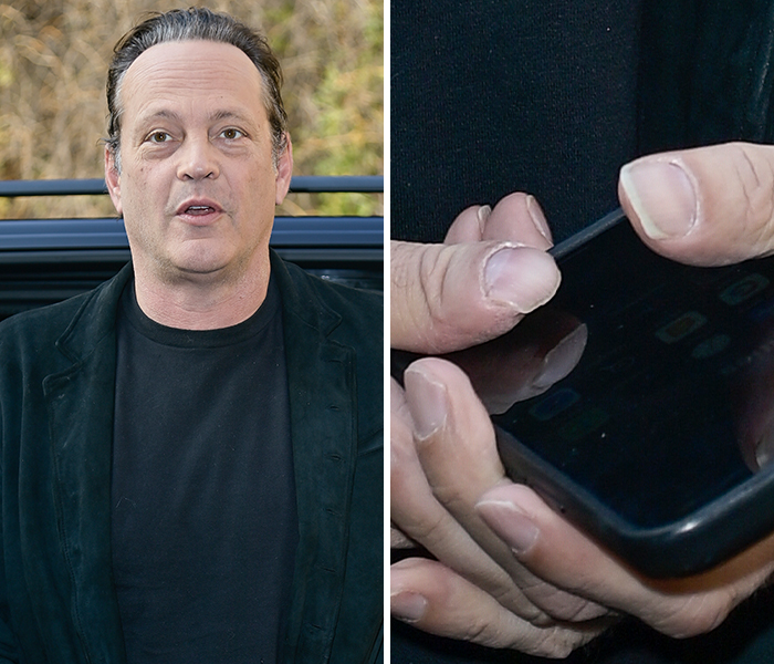 Actor with unusual finger anomaly holding a smartphone close-up, showcasing bizarre celebrity body anomalies.