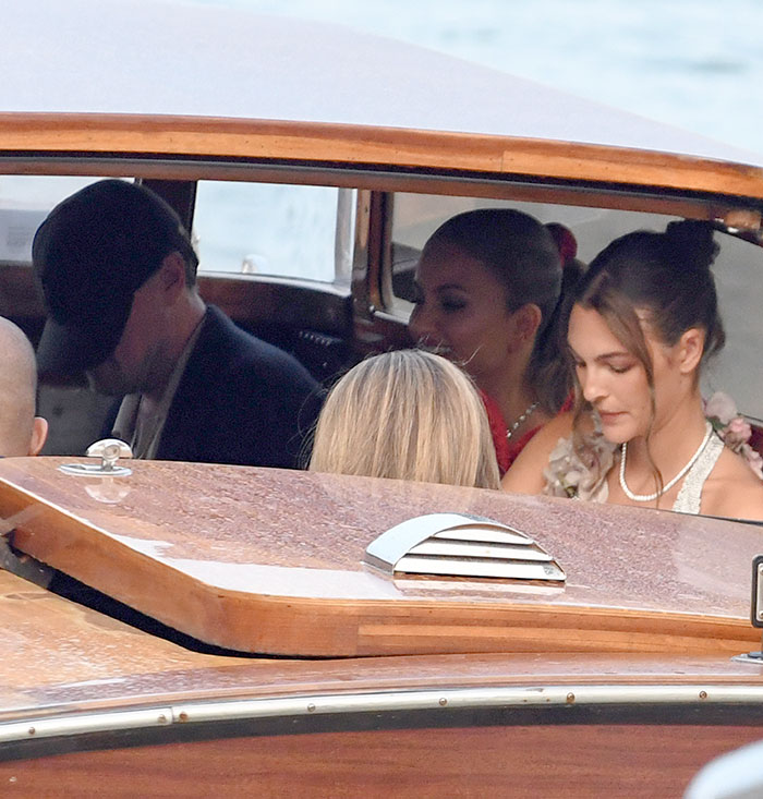 Leonardo DiCaprio's girlfriend in a boat at Jeff Bezos and Lauren Sánchez wedding event, candid moment captured. Leonardo DiCaprio's girlfriend in a boat at Jeff Bezos and Lauren Sánchez wedding event, candid moment captured.