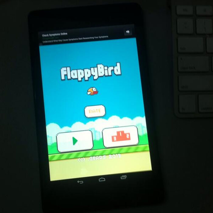 Flappy Bird game screen displayed on a mobile device highlighting the game's ban and 2025 revival discussion.