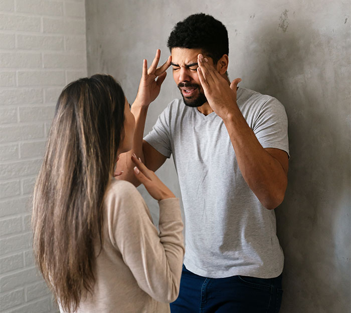 Husband arguing with wife over daughter's inheritance promised to freeloader sister, showing signs of stress and conflict. - 1