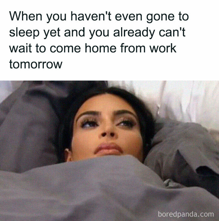 Woman lying in bed looking wide awake with caption about waiting to come home from work, funny work meme.