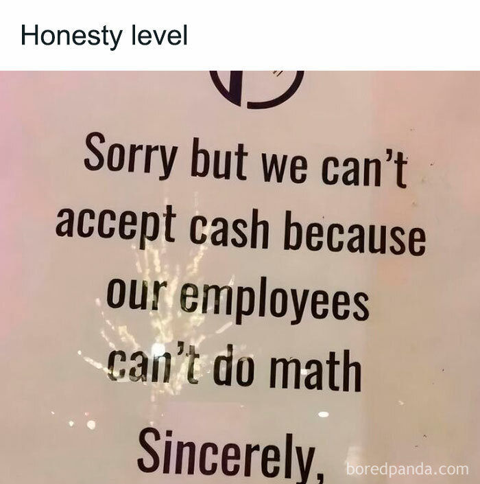 Humorous work sign about employees struggling with math, perfect for funny work memes to keep you going.