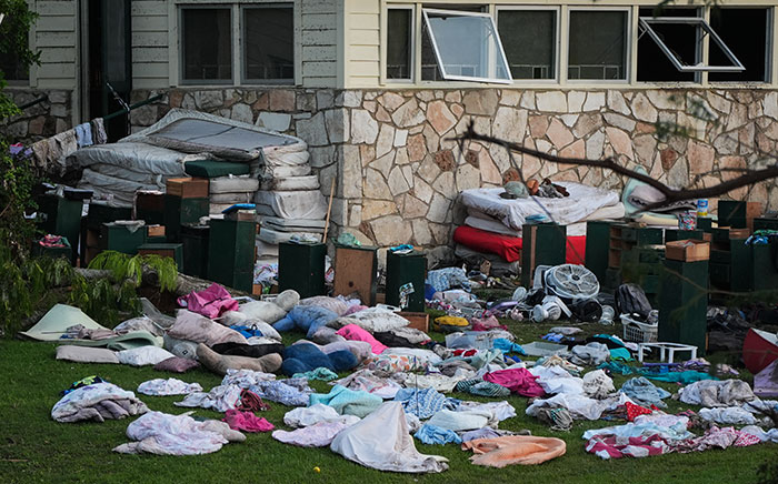 Camp Mystic counselor's heartbreaking scene with scattered belongings after returning last surviving kids to parents outdoors
