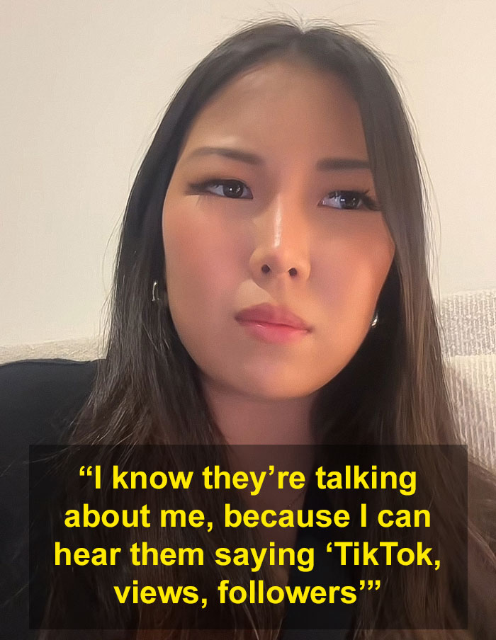 Young woman with long dark hair looking serious, discussing micro influencer follower count and TikTok views.