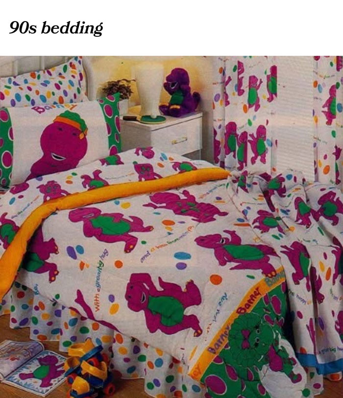 90s bedding featuring Barney the dinosaur character, evoking nostalgia for Tamagotchis and vintage VHS tapes.