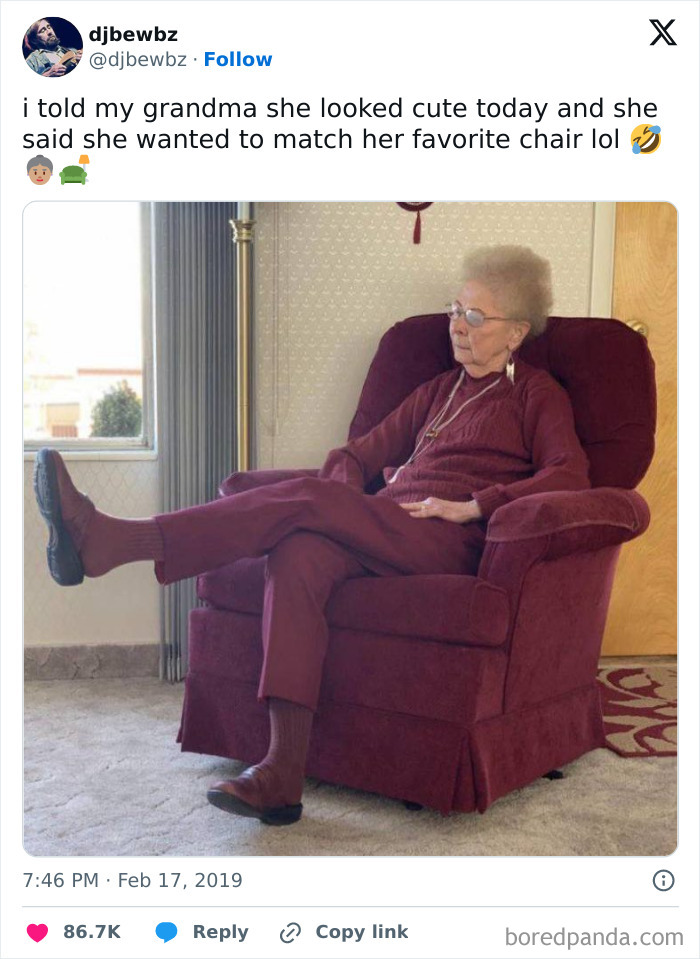 Elderly woman dressed in burgundy clothing matching her favorite chair, showcasing wholesome people that make the world better.