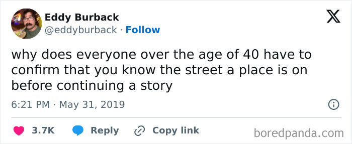 Tweet by Eddy Burback humorously questioning why people over 40 always confirm street locations before continuing a story, illustrating life after 40 chaos.