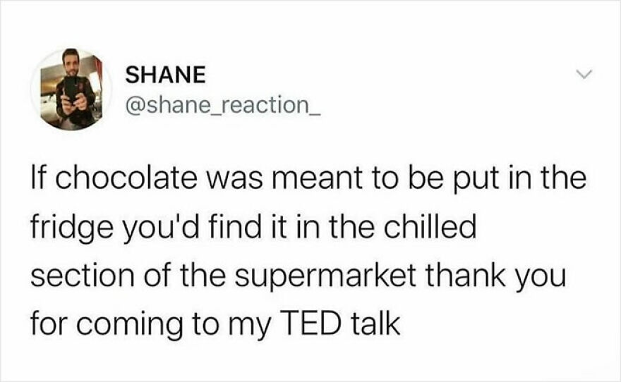 Tweet from user Shane about chocolate not belonging in the fridge, a humorous British meme for daily dose of British humor.