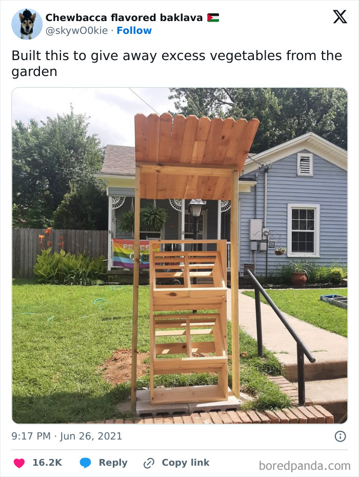 Wooden stand with shelves built outside a house to give away excess vegetables, showcasing wholesome people and community kindness.
