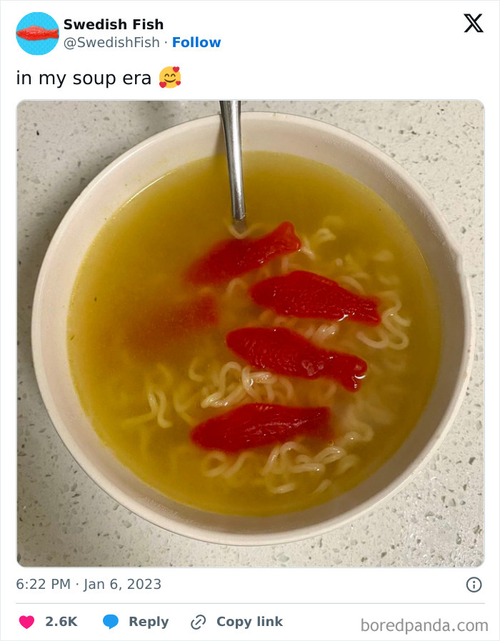 Bowl of soup with noodles and Swedish Fish candy floating, a funny post by an official social media account.