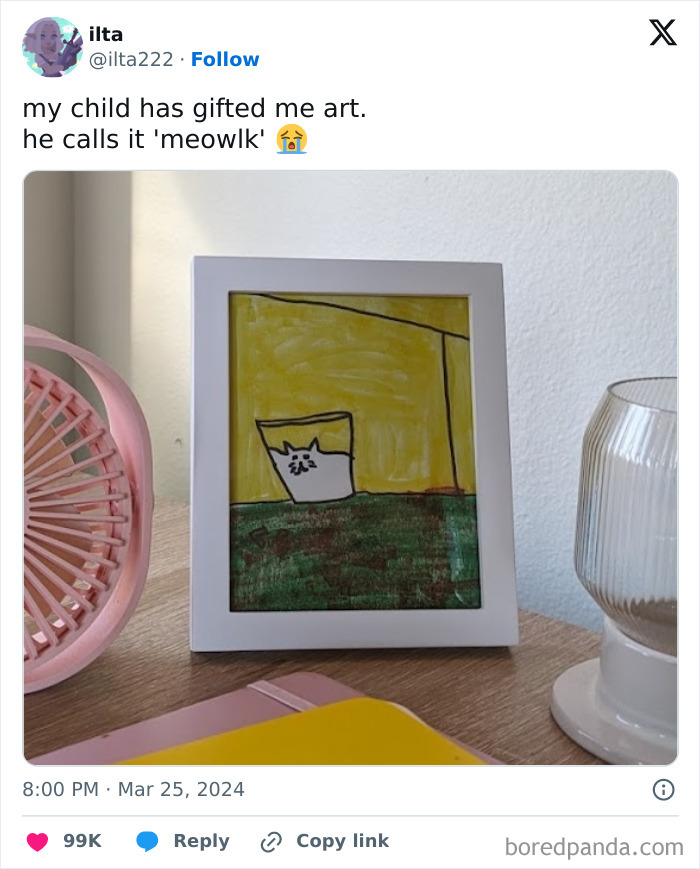 Child’s framed artwork of a cat titled meowlk on a desk, inspiring very important positivity when feeling down.