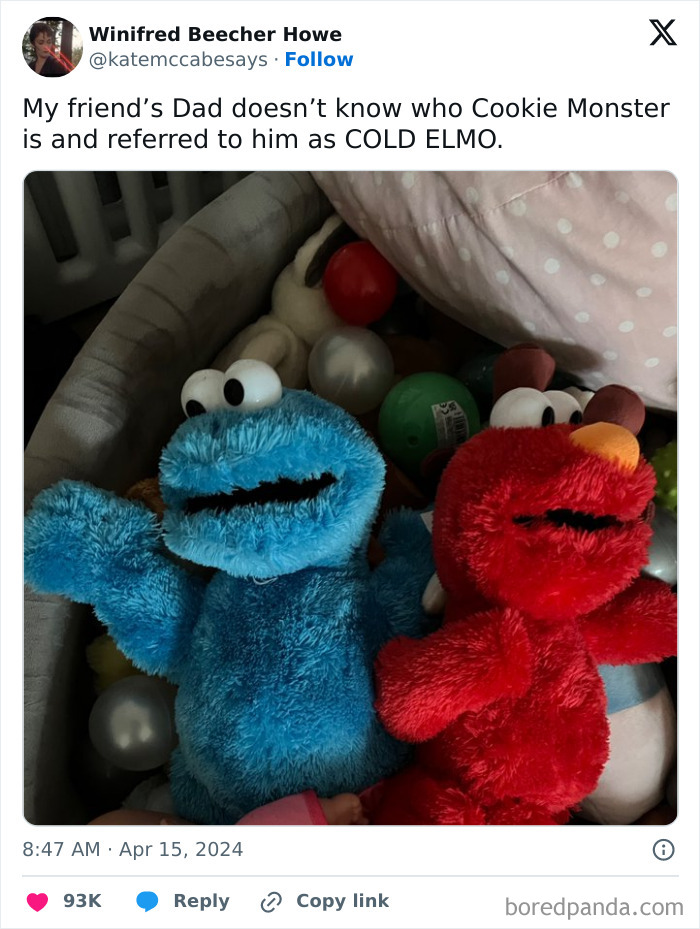 Plush toys of Cookie Monster and Elmo in a playful setting, highlighting very important positivity and uplifting posts.