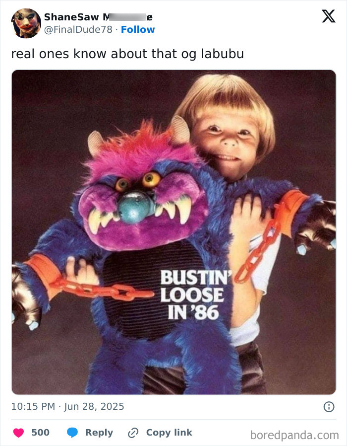 Child holding a colorful Labubu doll with chains, referencing popular Labubu doll memes online.