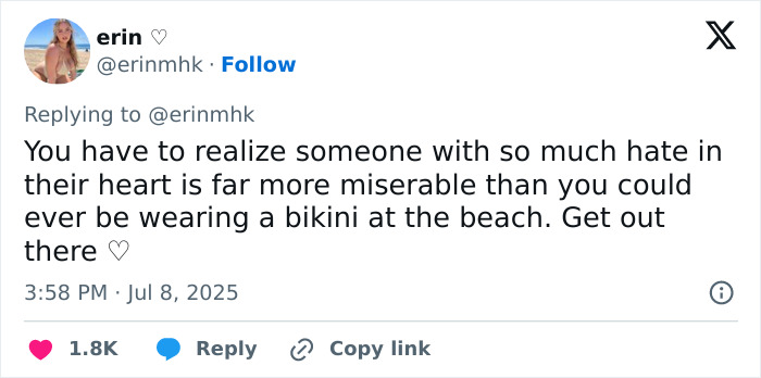 Plus-size model responds to fatphobic critics with empowering message about self-love and confidence in a bikini.