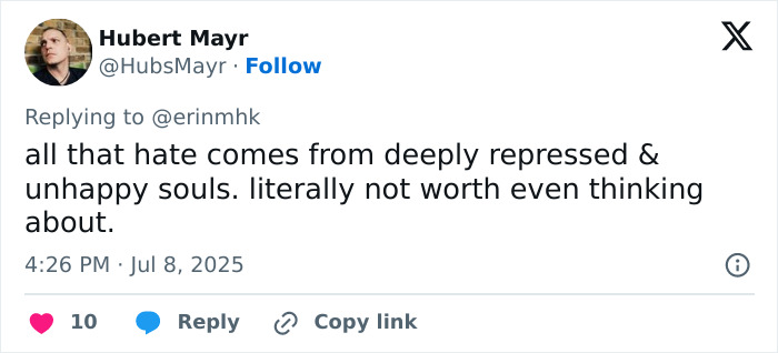 Tweet from Hubert Mayr addressing fatphobic critics with a plus-size model clapping back at hate comments online.