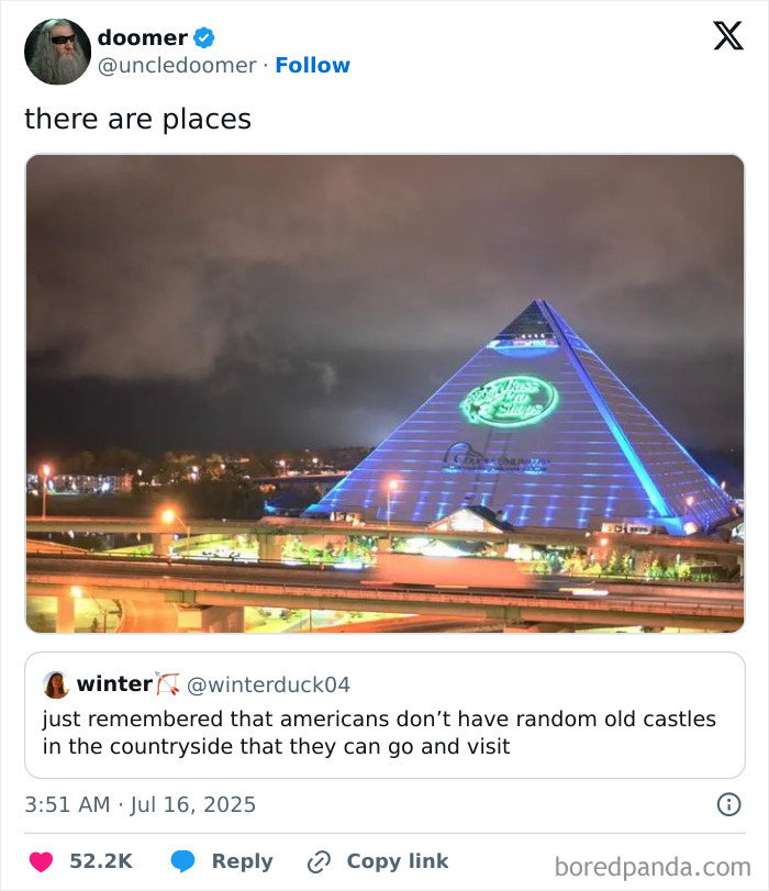 Night view of glowing pyramid building with a humorous tweet about Americans lacking random old castles to visit.