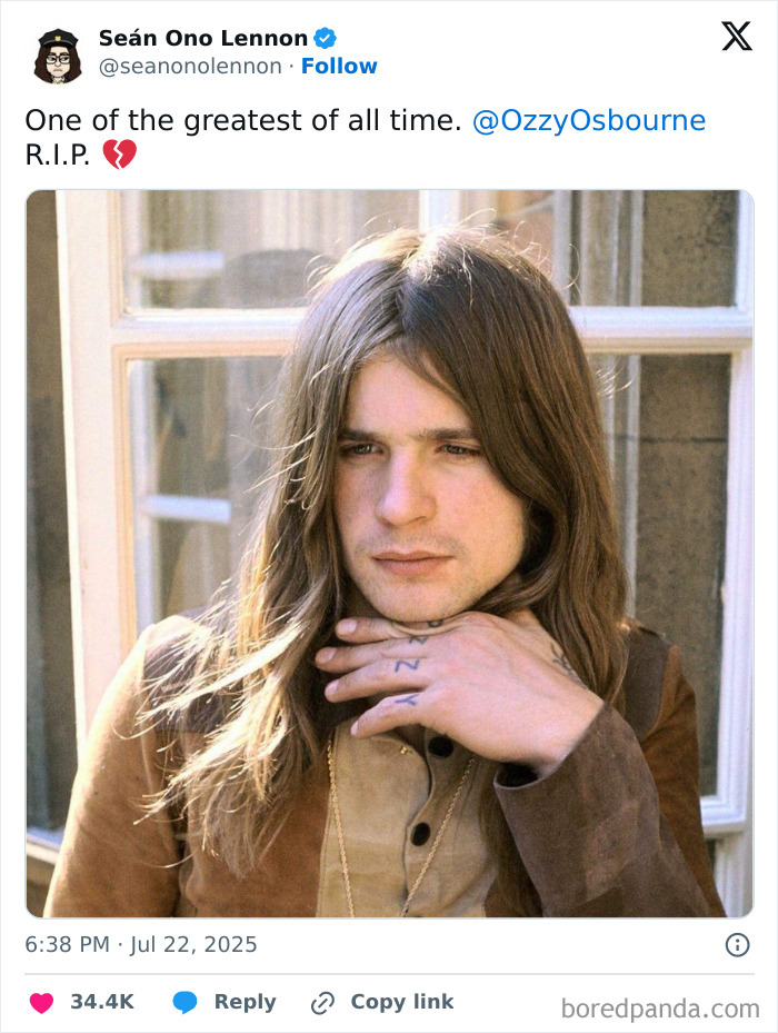 Young Ozzy Osbourne with long hair and hand resting on chin, featured in poignant tributes by rock legends.