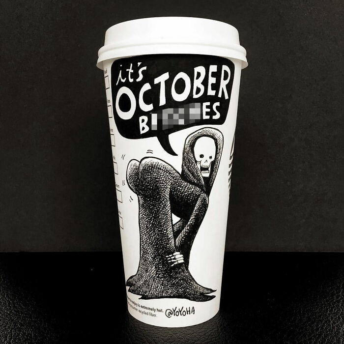 Coffee cup artwork featuring a humorous cartoon skeleton with the phrase October bites in black and white design.