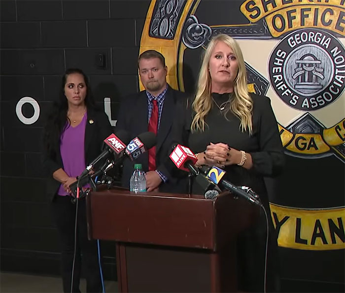 Female official speaks at a press conference about a tragic shooting involving a 6-year-old girl and her sister, 17.