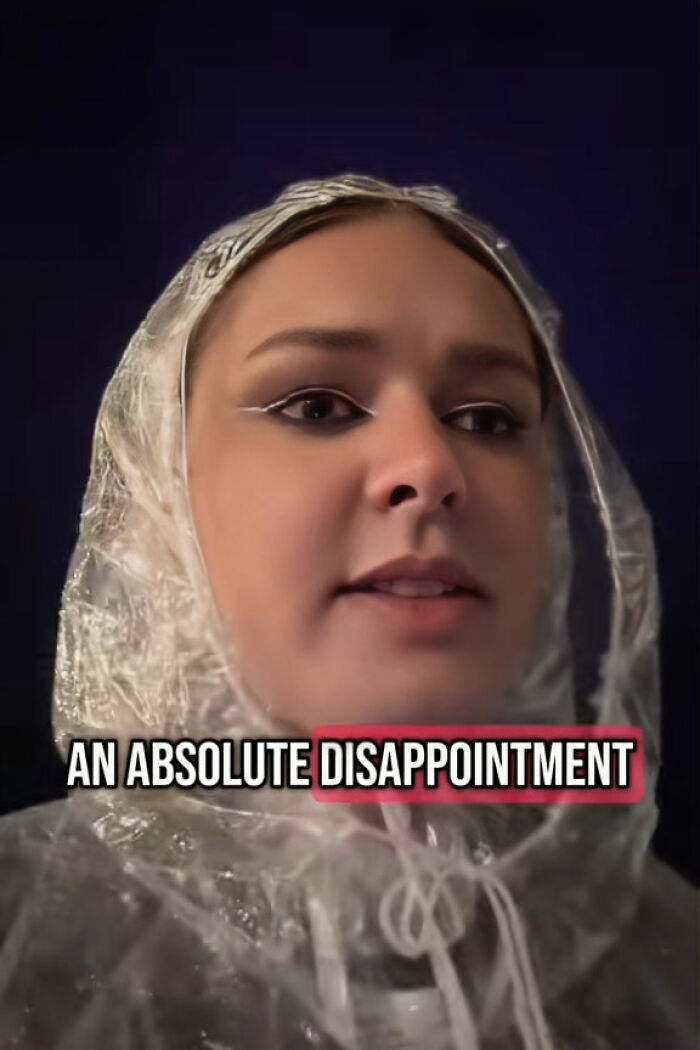 A fan wearing a rain poncho at Justin Timberlake&rsquo;s Romania show expressing disappointment and crowd unrest.