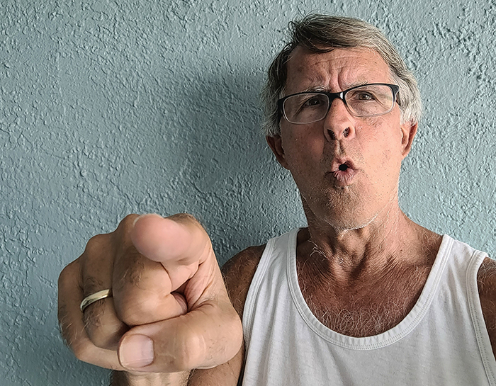 Angry boomer man pointing aggressively, representing boomers involved in barbershop incident and police arrest. Angry boomer man pointing aggressively, representing boomers involved in barbershop incident and police arrest.