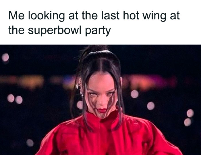 Woman in a red outfit with an intense look, caption about eyeing the last hot wing at a Superbowl party, funny post.
