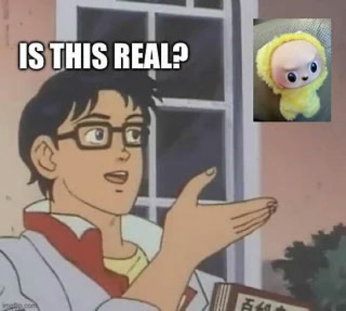 Man in meme pointing at blurry yellow Labubu doll with text asking if this Labubu doll is real online.