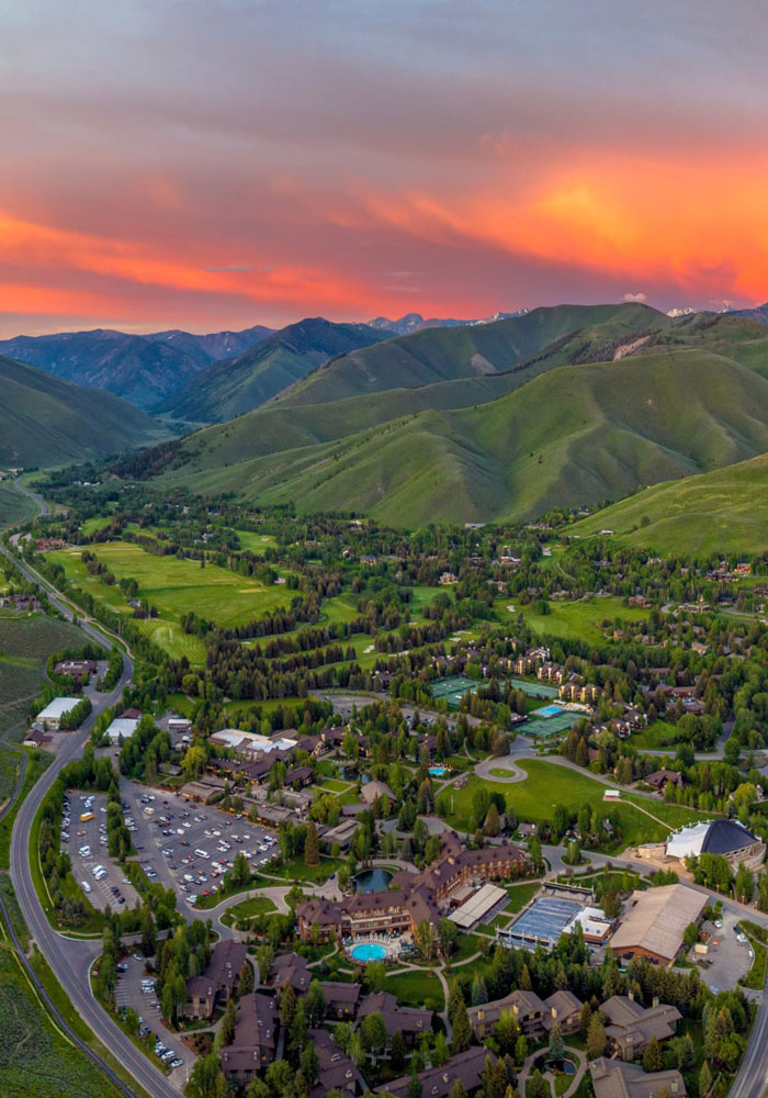 Aerial view of a mountain town at sunset, unrelated to Jeff Bezos ditching his signature bald look.